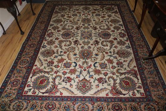 A Isfahan style ivory ground carpet, 10ft 10in by 7ft 8in.